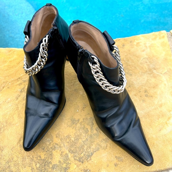 Manolo Blahnik Shoes - Manolo Blahnik black leather booties w/chain. Size 37.5